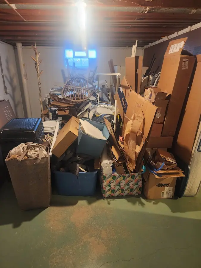 Roll-off dumpster container at job site for Yard Waste Dumpster Rental in Meadow Oaks